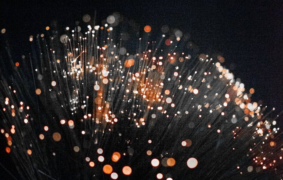 macro photography of orange fiber optic lamp